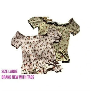 Two floral off shoulder tops, very cute. New with tags. Size large.